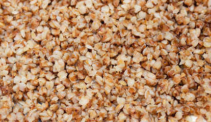 Buckwheat. Background and texture of buckwheat. Boiled buckwheat.