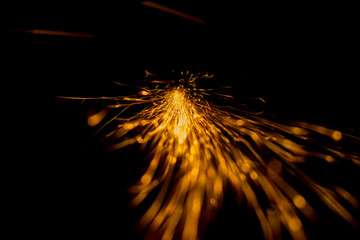 a bunch of fire sprays on a black background
