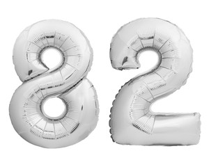 Silver chrome number 82 eighty two made of inflatable balloon on white