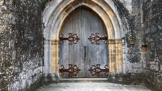 Old medieval door on old catholic church