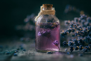Concept spa therapy. Fresh lavender blossoms with Natural handmade lavender oil, sea salt.