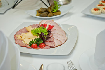 delicious dishes on the table in the restaurant. serving table.
