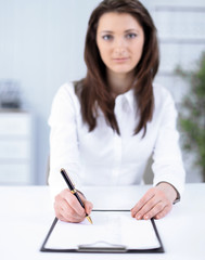 modern business woman working with documents in the workplace