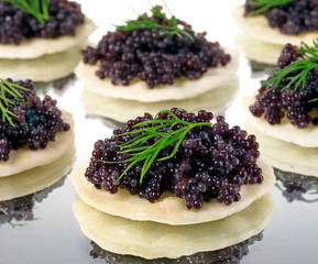 RUSSIAN CAVIAR ON RICE CRACKERS