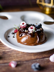 Chocolate cream mousse cake with fresh berries. delicious dessert.