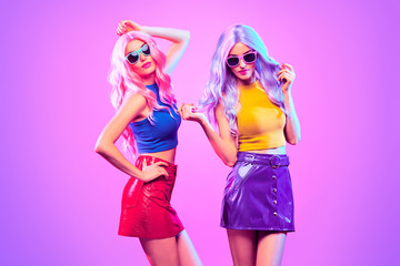 Fashion. Disco Party girl dance in neon light