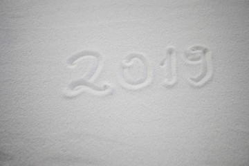 2019 written on the snow. Happy new 2019 year. Empty space for your text