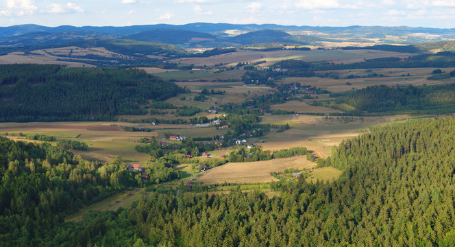 A panoramic view from the Pilgrim peak to the city of Wambierzyce. High resolution mountain landscape. Poland, Sudety, Table Mountains