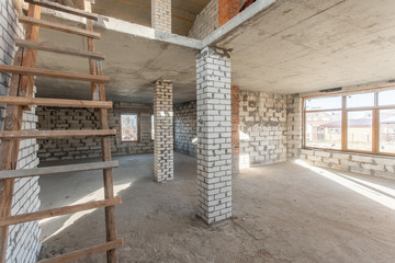 The second attic floor of the house. overhaul and reconstruction. Working process of warming inside part of roof. House or apartment is under construction, remodeling, renovation, restoration.