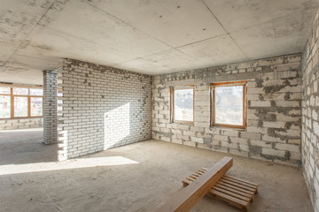 The second attic floor of the house. overhaul and reconstruction. Working process of warming inside part of roof. House or apartment is under construction, remodeling, renovation, restoration.
