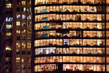 Modern office building at night. Night lights, city office building downtown, cityscape view