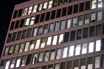 Modern office building at night. Night lights, city office building downtown, cityscape view