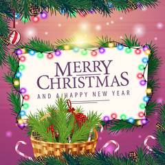 Merry Christmas and happy New Year - Christmas card with basket with Christmas tree branch