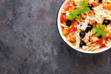 Minestrone, italian vegetarian soup with pasta and vegetables