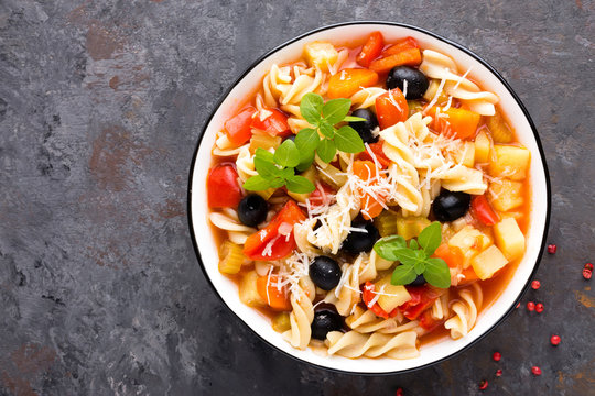 Minestrone, italian vegetarian soup with pasta and vegetables