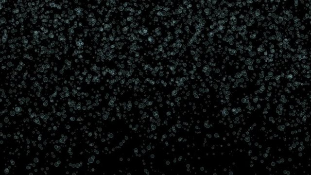 Champagne gives off bubbles.Bubble Surges on Black Background