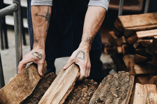 Man holding firewood