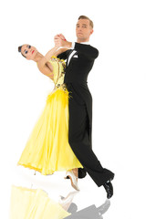 ballroom dancers. ballroom dance couple in a dance pose isolated on white background. ballroom sensual proffessional dancers dancing walz, tango, slowfox and quickstep. just dance