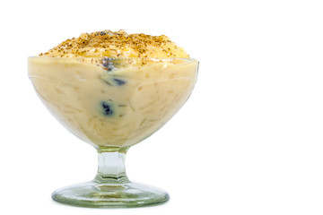 Traditional Colombian dessert made of rice and milk called arroz de leche isolated in white background