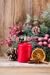 Christmas greeting card. Festive decoration on wooden background. New Year concept. Copy space.  Flat lay. Top view.