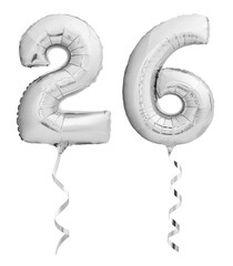 Silver chrome number 26 twenty six made of inflatable balloon with ribbon isolated on white