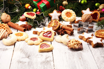 Baking christmas cookies. Typical cinnamon stars bakery for xmas with ingredients.