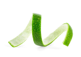 Curly lime peel twist isolated on white background