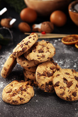 Chocolate cookies on rustic table. Chocolate chip cookies shot