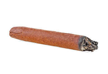 Brown cigar burned on white background