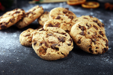 Chocolate cookies on rustic table. Chocolate chip cookies shot