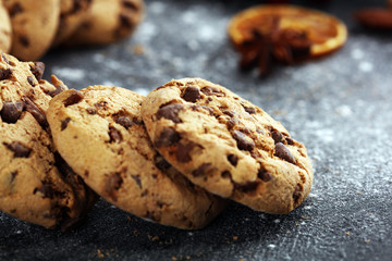 Chocolate cookies on rustic table. Chocolate chip cookies shot