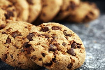 Chocolate cookies on rustic table. Chocolate chip cookies shot