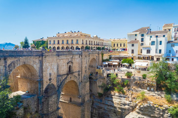 Naklejka na ściany i meble Old roman bridge in the spanish town of Ronda