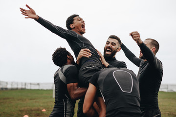 Soccer players celebrating