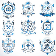 Fototapeta premium Heraldic vector signs decorated with vintage elements, monarch crowns, religious crosses, armory and animals. Set of classy symbolic graphic insignias.