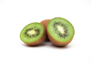 Fototapeta premium Ripe whole kiwi fruit and half kiwi fruit isolated on white background