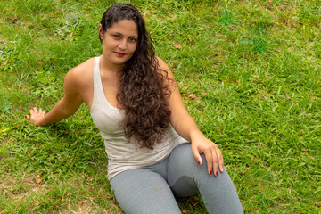 woman sitting on the grass