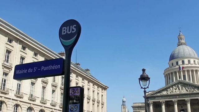 Background of Pantheon, a building in the Latin Quarter in Paris with public transportation bus stop sign, SLOW MOTION
