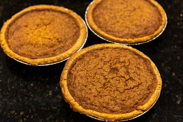 Three Sugar Pies on Kitchen Countertop