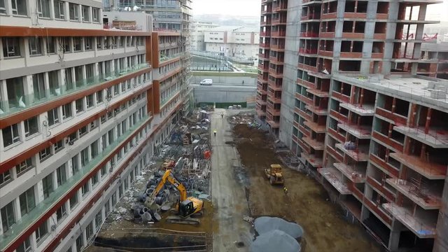 Aerial view of construction site - Many consturction workers have different type of tasks3