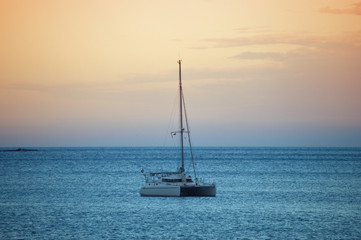 Fototapeta premium Ship sailing in the Mediterranean at sunset