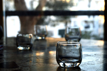 Crystal glasses over stone table