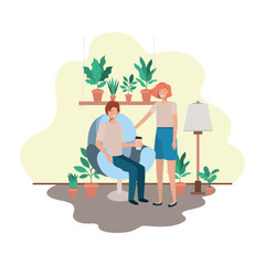 couple in living room drinking coffee