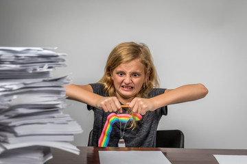 Girl Frustrated by Homework Snapping Pencil