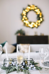 A glass of champagne. Serving a festive table. New year decorations. Christmas and  New Year concept