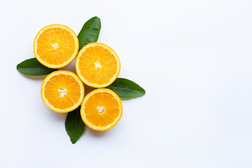 Fototapeta na wymiar Fresh orange citrus fruit with leaves isolated on white wooden background. Copy space