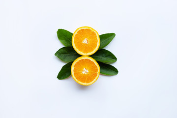 Fresh orange citrus fruit with leaves isolated on white wooden background.  Copy space
