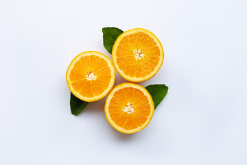 Fresh orange citrus fruit with leaves isolated on white wooden background.  Top view