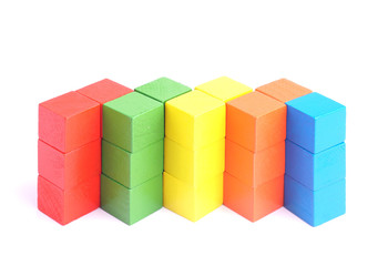 Obraz premium Colorful wooden cube isolated on white background.