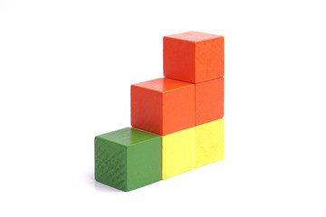 Obraz premium Colorful wooden cube isolated on white background.